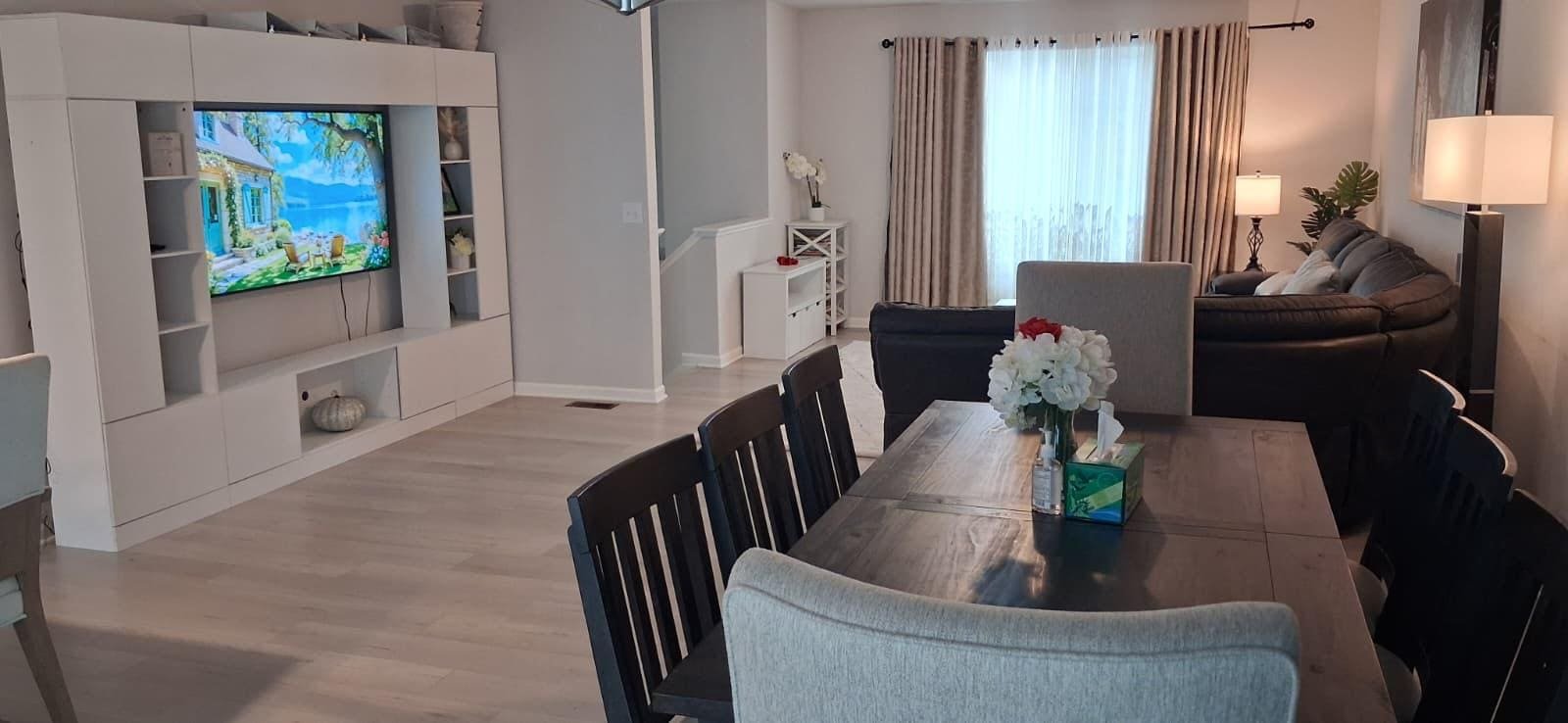 Bright open-plan living and dining area at Angie Home Care AFC