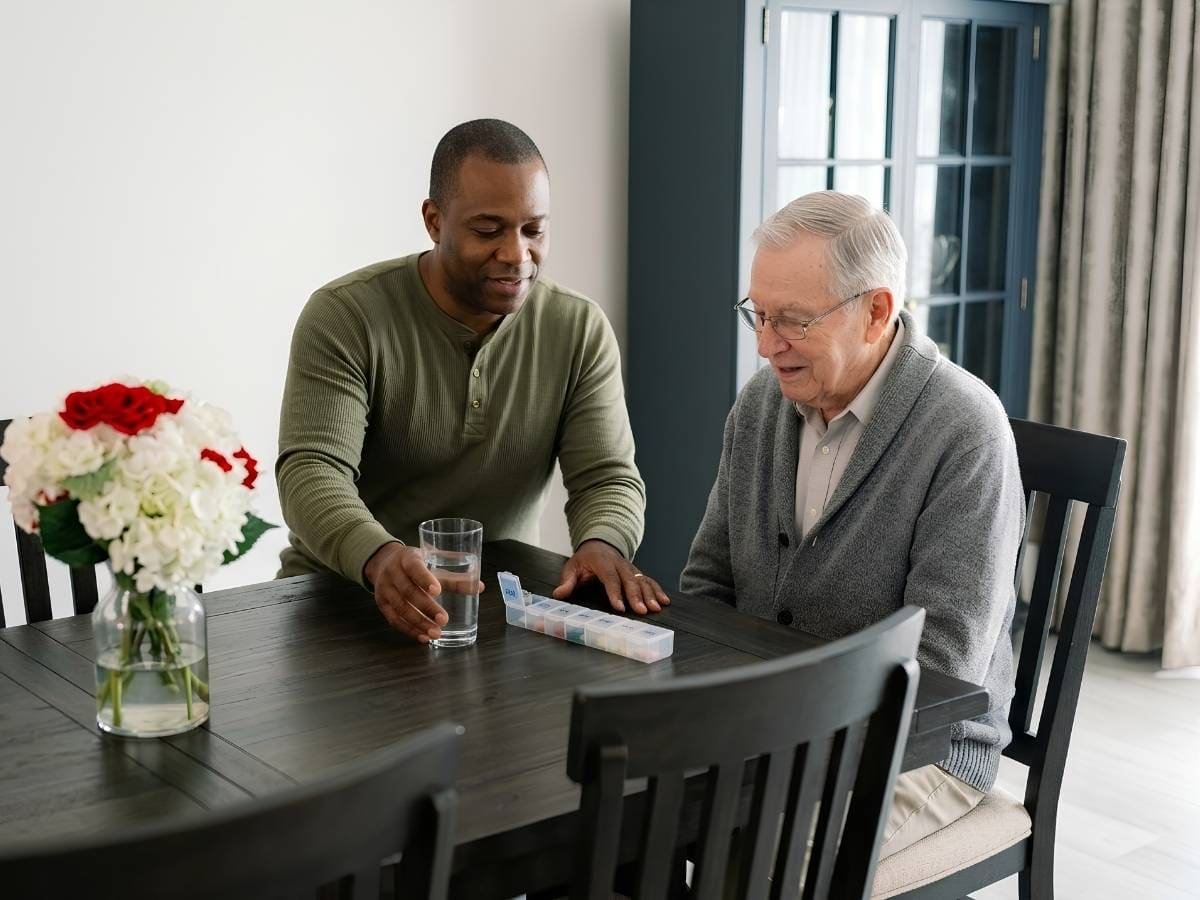 Caregiver and resident planning the week together at Angie Home Care